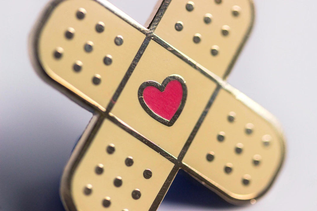 Heart Bandage Enamel Pin