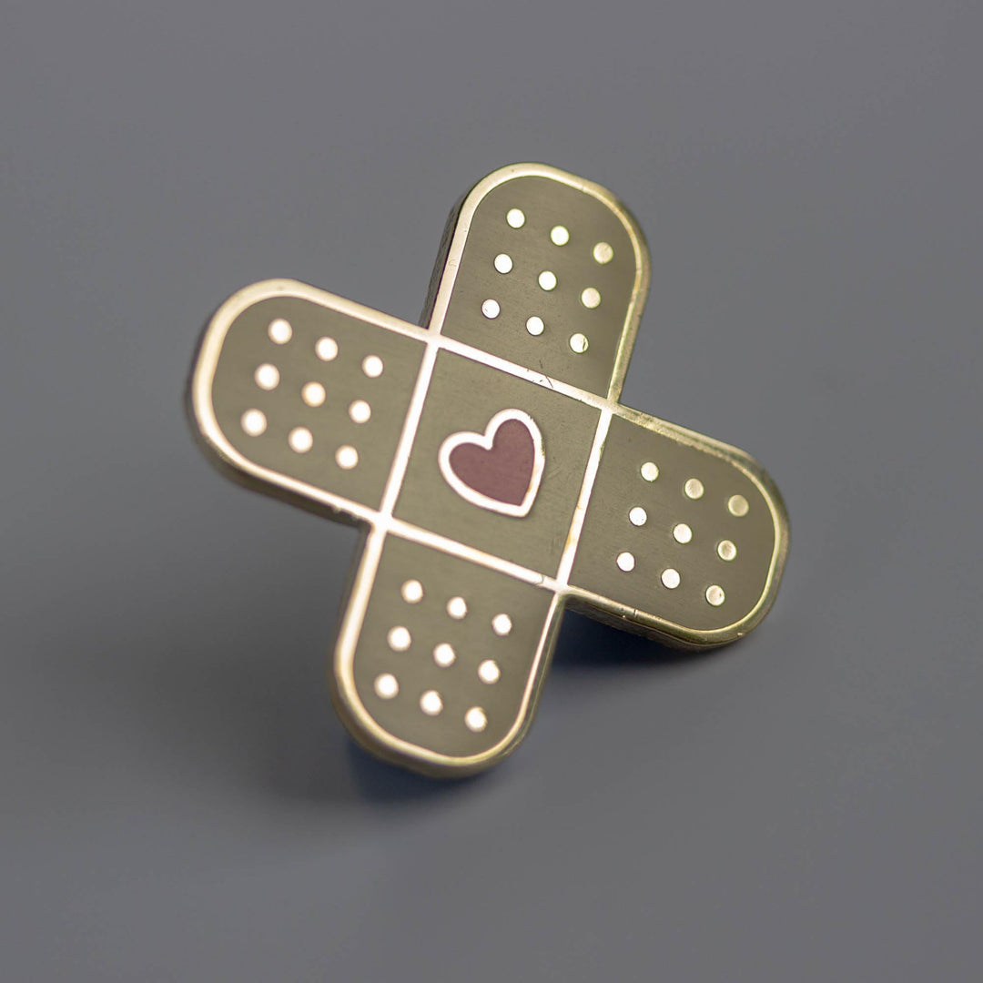 Heart Bandage Enamel Pin