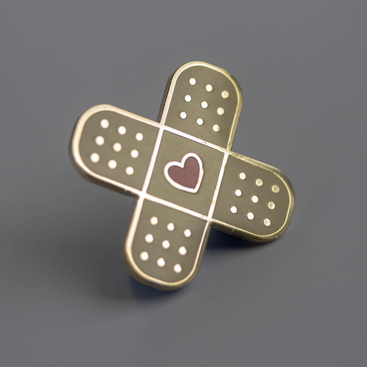 Heart Bandage Enamel Pin